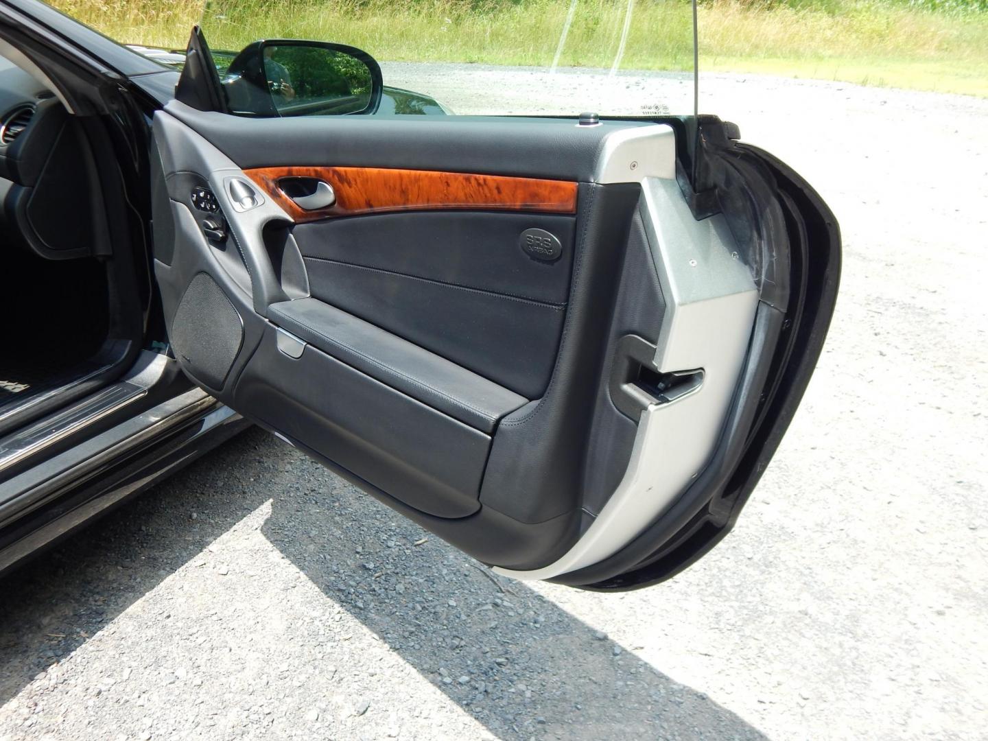 2009 Black /Black Mercedes-Benz SL-Class SL550 (WDBSK71F99F) with an 5.5L V8 DOHC 32V engine, 7-Speed Automatic transmission, located at 6528 Lower York Road, New Hope, PA, 18938, (215) 862-9555, 40.358707, -74.977882 - Here we have a Mercedes SL500 convertible with a 5.5L V8 putting power to the rear wheels via an automatic transmission. Options include: black leather with wood trim, heated and cooled seats, air scarf, power seats, dual climate controls, AM/FM/CD/SAT/AUX radio with navigation, power tilt steering - Photo#13