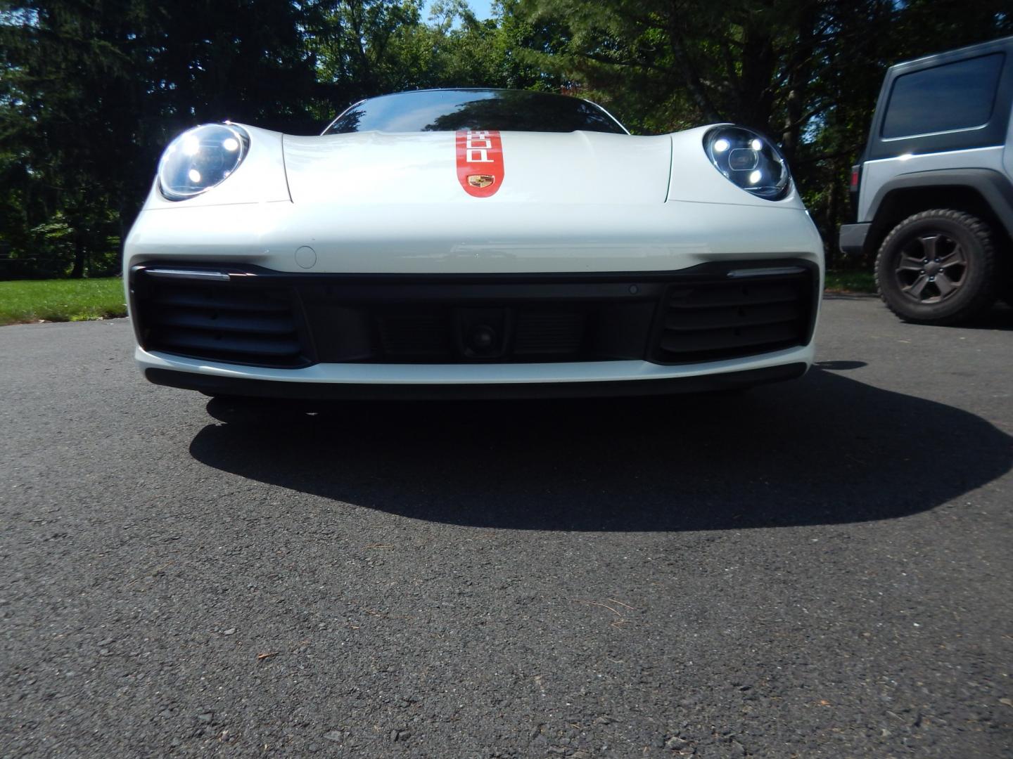 2020 White /Black Porsche 911 Carrera Coupe (WP0AA2A90LS) with an 3.0L H6 DOHC 24V Twin-Turbo engine, Automatic transmission, located at 6528 Lower York Road, New Hope, PA, 18938, (215) 862-9555, 40.358707, -74.977882 - Here we have a very nice running and driving Porsche 911 with a 3.0L 6 cylinder engine putting power to the rear wheels via an automatic transmission. Options include: Sport Chrono plus package, black leather seats, comfort equipment, 20 inch front wheels and 21 inch rear wheels wrapped in Pirelli P- Photo#27