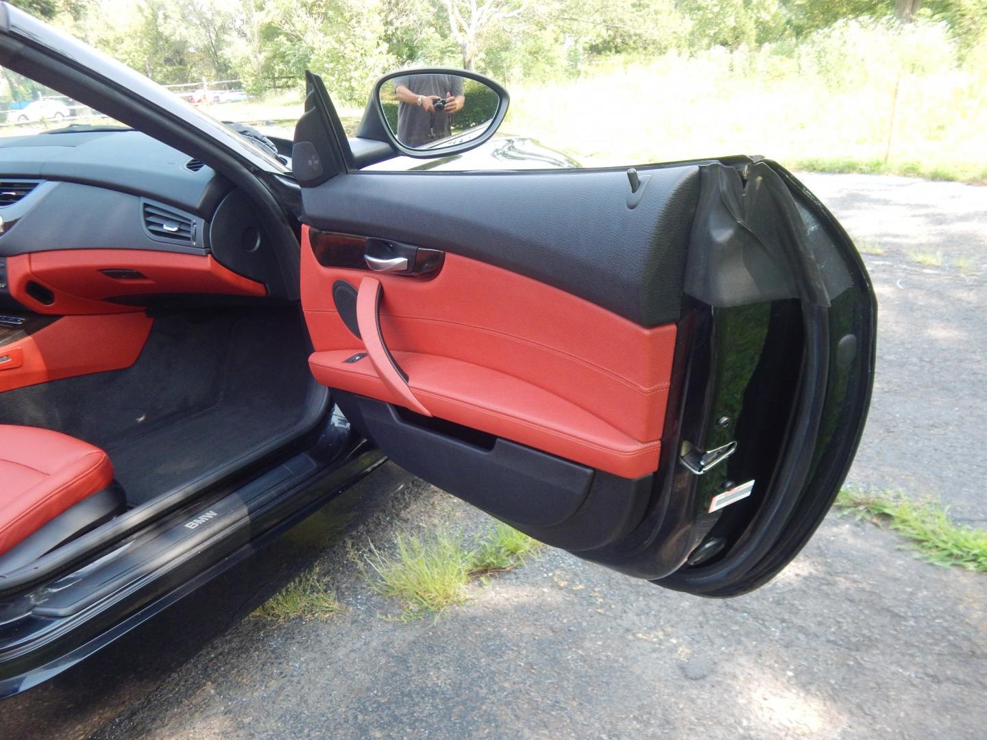 2013 Black /Red BMW Z4 sDrive28i (WBALL5C59DE) with an 2.0L L4 DOHC 16V TURBO engine, Manual transmission, located at 6528 Lower York Road, New Hope, PA, 18938, (215) 862-9555, 40.358707, -74.977882 - Here we have a BMW Z4 convertible with a 2.0L inline 4 cylinder turbo engine cutting power to the rear wheels via a 6 speed manual transmission. Options include: red leather, AM/FM/SIR/AUX radio, dual climate controls, heated seats, dual power seats, push button start, automatic headlights, cruise c- Photo#13