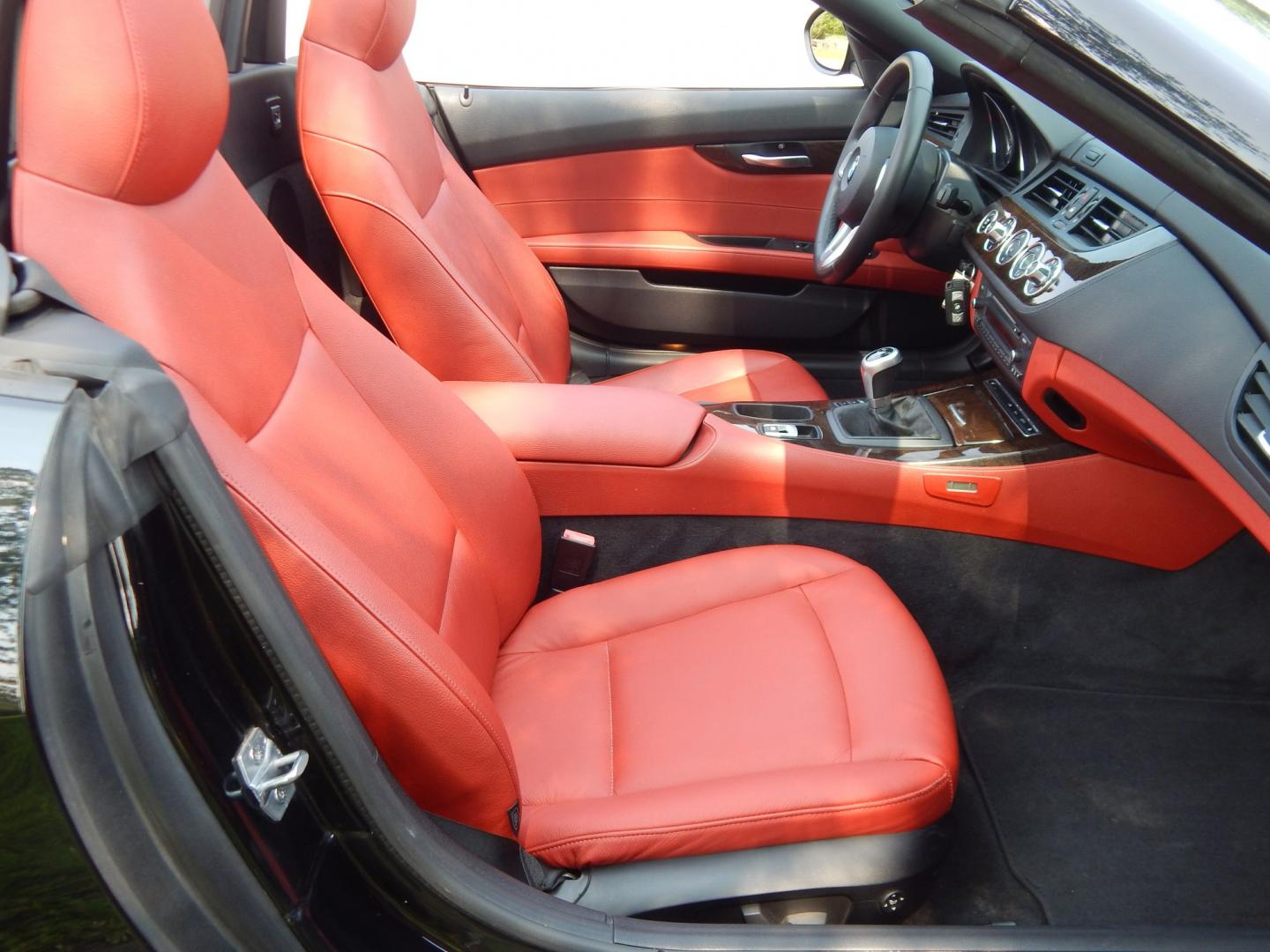 2013 Black /Red BMW Z4 sDrive28i (WBALL5C59DE) with an 2.0L L4 DOHC 16V TURBO engine, Manual transmission, located at 6528 Lower York Road, New Hope, PA, 18938, (215) 862-9555, 40.358707, -74.977882 - Here we have a BMW Z4 convertible with a 2.0L inline 4 cylinder turbo engine cutting power to the rear wheels via a 6 speed manual transmission. Options include: red leather, AM/FM/SIR/AUX radio, dual climate controls, heated seats, dual power seats, push button start, automatic headlights, cruise c- Photo#14