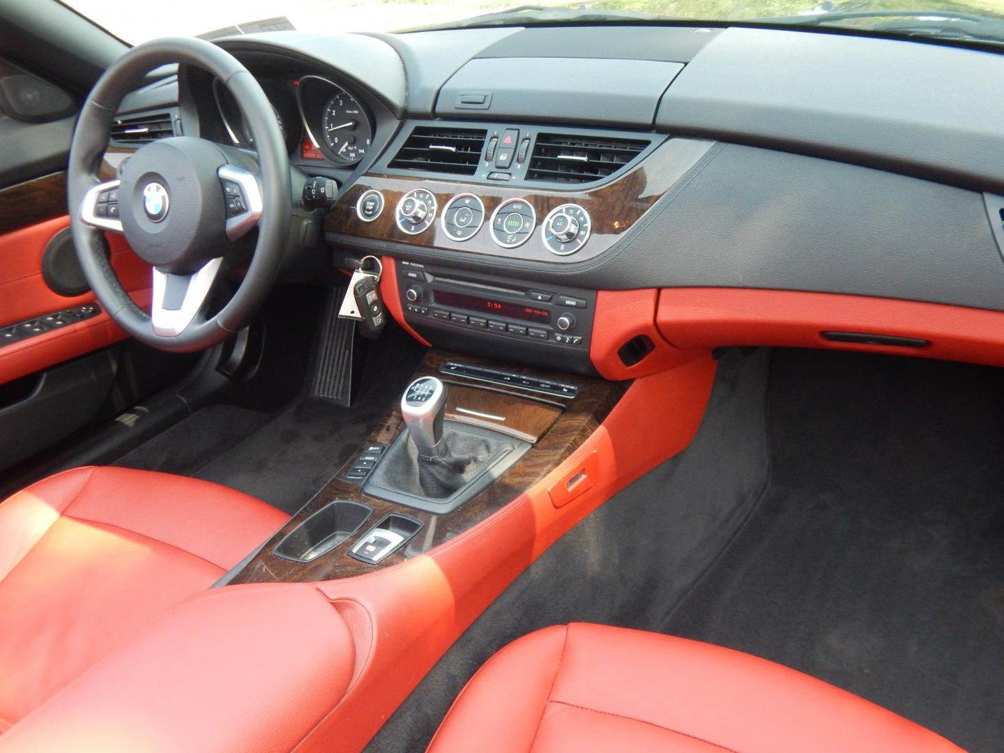 2013 Black /Red BMW Z4 sDrive28i (WBALL5C59DE) with an 2.0L L4 DOHC 16V TURBO engine, Manual transmission, located at 6528 Lower York Road, New Hope, PA, 18938, (215) 862-9555, 40.358707, -74.977882 - Here we have a BMW Z4 convertible with a 2.0L inline 4 cylinder turbo engine cutting power to the rear wheels via a 6 speed manual transmission. Options include: red leather, AM/FM/SIR/AUX radio, dual climate controls, heated seats, dual power seats, push button start, automatic headlights, cruise c- Photo#16