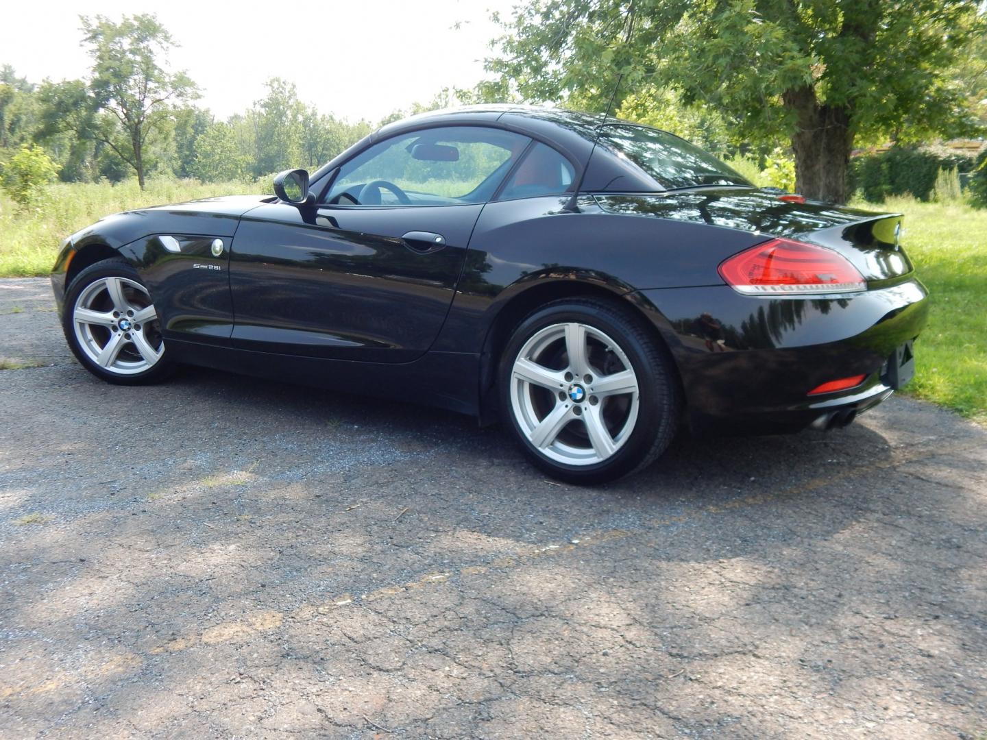 2013 Black /Red BMW Z4 sDrive28i (WBALL5C59DE) with an 2.0L L4 DOHC 16V TURBO engine, Manual transmission, located at 6528 Lower York Road, New Hope, PA, 18938, (215) 862-9555, 40.358707, -74.977882 - Here we have a BMW Z4 convertible with a 2.0L inline 4 cylinder turbo engine cutting power to the rear wheels via a 6 speed manual transmission. Options include: red leather, AM/FM/SIR/AUX radio, dual climate controls, heated seats, dual power seats, push button start, automatic headlights, cruise c- Photo#15