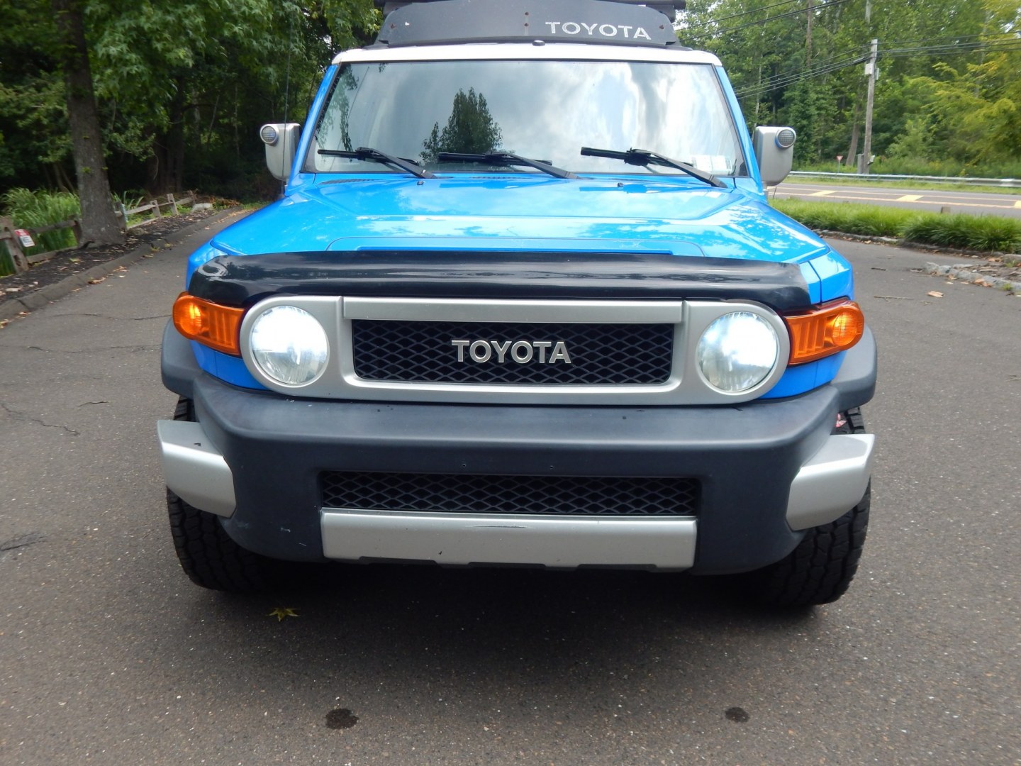 2007 Blue /Black Toyota FJ Cruiser 4WD (JTEBU11F770) with an 4.0L V6 engine, Manual transmission, located at 6528 Lower York Road, New Hope, PA, 18938, (215) 862-9555, 40.358707, -74.977882 - Here we have a very cool FJ cruiser with a 4.0L V6 putting power to all four wheels via a 6 speed manual transmission. Options include: black cloth seats, manual moving seats, AC, heat, AM/FM/CD/AUX/SAT radio, cruise control, tilt steering wheel, power windows/locks/mirrors, roof rack, rear ladder,- Photo#6
