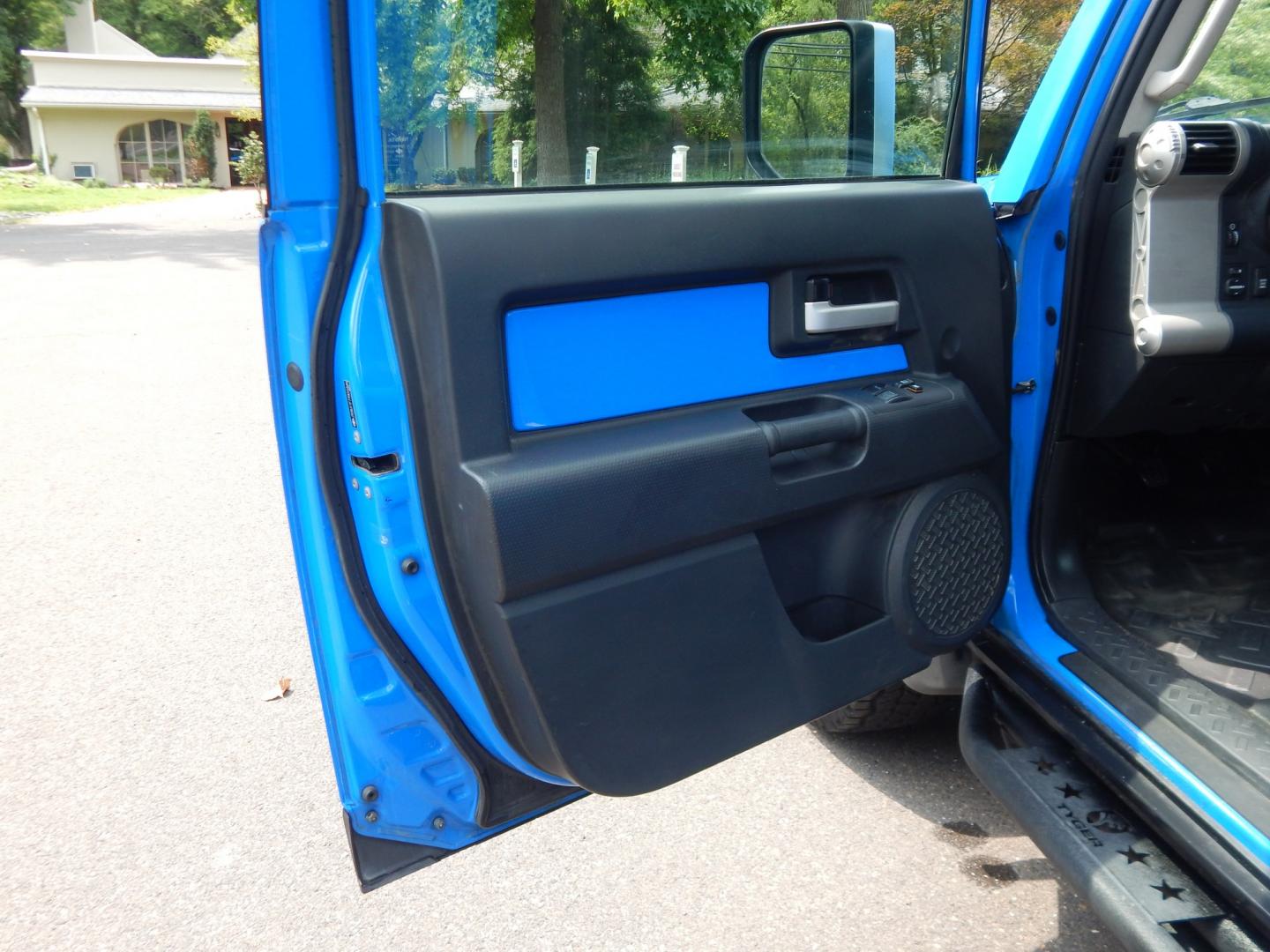 2007 Blue /Black Toyota FJ Cruiser 4WD (JTEBU11F770) with an 4.0L V6 engine, Manual transmission, located at 6528 Lower York Road, New Hope, PA, 18938, (215) 862-9555, 40.358707, -74.977882 - Here we have a very cool FJ cruiser with a 4.0L V6 putting power to all four wheels via a 6 speed manual transmission. Options include: black cloth seats, manual moving seats, AC, heat, AM/FM/CD/AUX/SAT radio, cruise control, tilt steering wheel, power windows/locks/mirrors, roof rack, rear ladder,- Photo#10