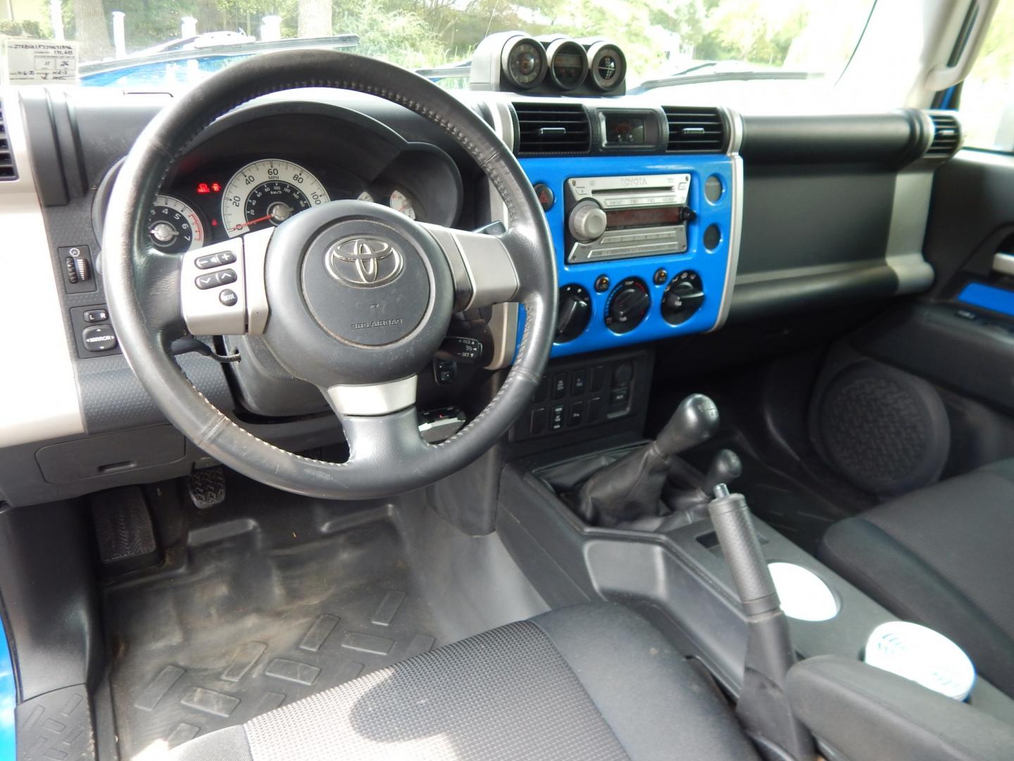 2007 Blue /Black Toyota FJ Cruiser 4WD (JTEBU11F770) with an 4.0L V6 engine, Manual transmission, located at 6528 Lower York Road, New Hope, PA, 18938, (215) 862-9555, 40.358707, -74.977882 - Here we have a very cool FJ cruiser with a 4.0L V6 putting power to all four wheels via a 6 speed manual transmission. Options include: black cloth seats, manual moving seats, AC, heat, AM/FM/CD/AUX/SAT radio, cruise control, tilt steering wheel, power windows/locks/mirrors, roof rack, rear ladder,- Photo#14