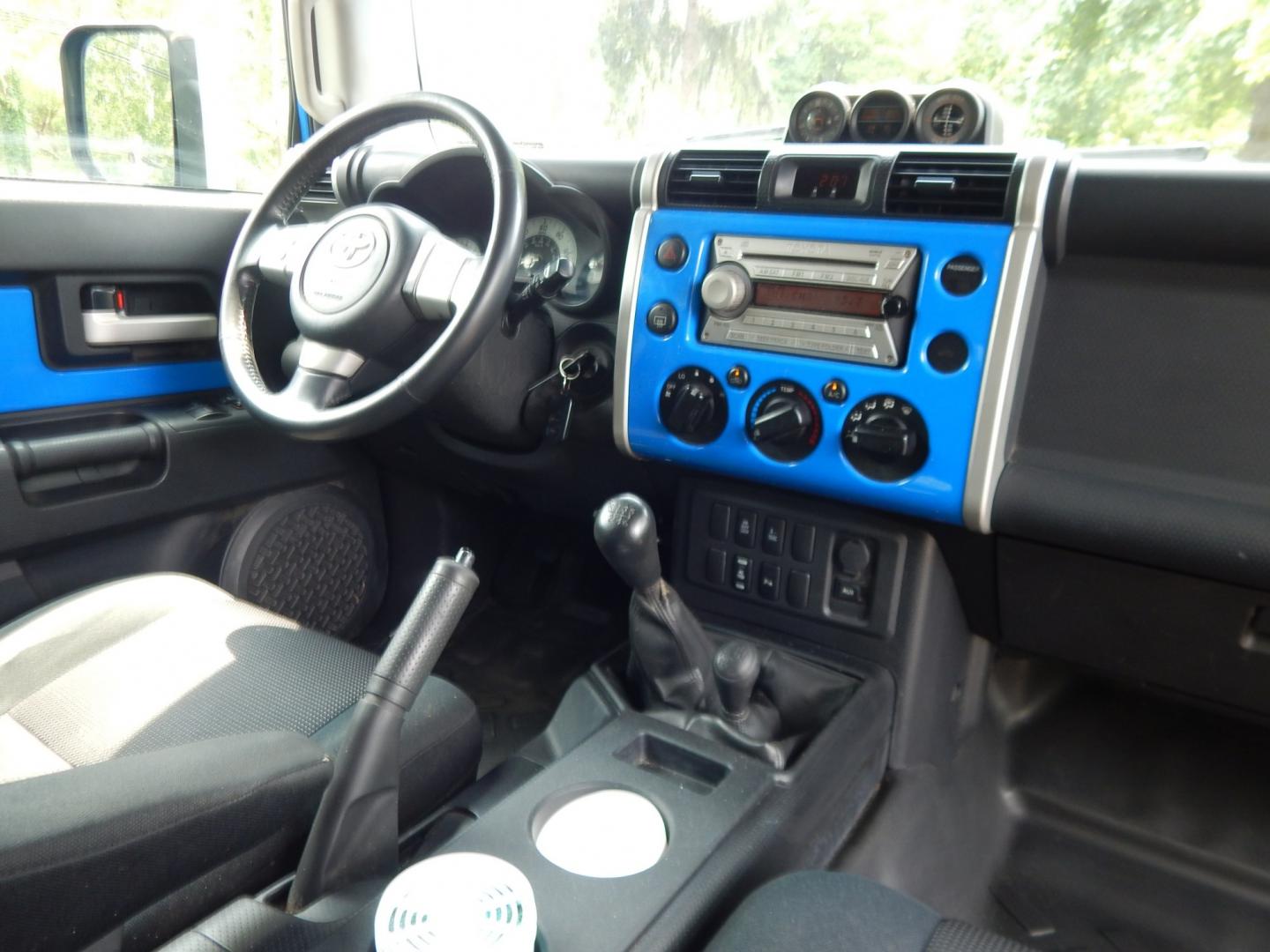 2007 Blue /Black Toyota FJ Cruiser 4WD (JTEBU11F770) with an 4.0L V6 engine, Manual transmission, located at 6528 Lower York Road, New Hope, PA, 18938, (215) 862-9555, 40.358707, -74.977882 - Here we have a very cool FJ cruiser with a 4.0L V6 putting power to all four wheels via a 6 speed manual transmission. Options include: black cloth seats, manual moving seats, AC, heat, AM/FM/CD/AUX/SAT radio, cruise control, tilt steering wheel, power windows/locks/mirrors, roof rack, rear ladder,- Photo#18