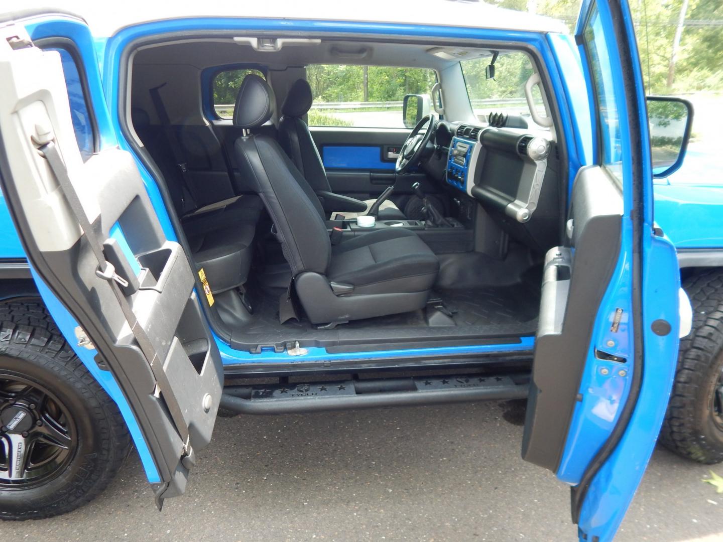 2007 Blue /Black Toyota FJ Cruiser 4WD (JTEBU11F770) with an 4.0L V6 engine, Manual transmission, located at 6528 Lower York Road, New Hope, PA, 18938, (215) 862-9555, 40.358707, -74.977882 - Here we have a very cool FJ cruiser with a 4.0L V6 putting power to all four wheels via a 6 speed manual transmission. Options include: black cloth seats, manual moving seats, AC, heat, AM/FM/CD/AUX/SAT radio, cruise control, tilt steering wheel, power windows/locks/mirrors, roof rack, rear ladder,- Photo#17