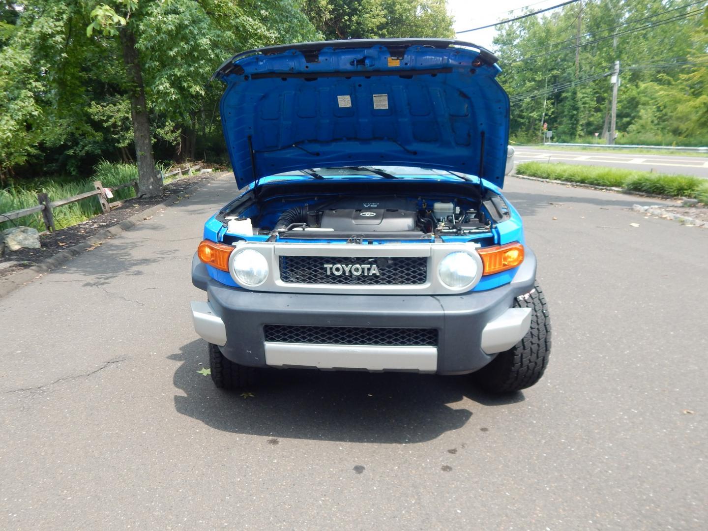 2007 Blue /Black Toyota FJ Cruiser 4WD (JTEBU11F770) with an 4.0L V6 engine, Manual transmission, located at 6528 Lower York Road, New Hope, PA, 18938, (215) 862-9555, 40.358707, -74.977882 - Here we have a very cool FJ cruiser with a 4.0L V6 putting power to all four wheels via a 6 speed manual transmission. Options include: black cloth seats, manual moving seats, AC, heat, AM/FM/CD/AUX/SAT radio, cruise control, tilt steering wheel, power windows/locks/mirrors, roof rack, rear ladder,- Photo#22