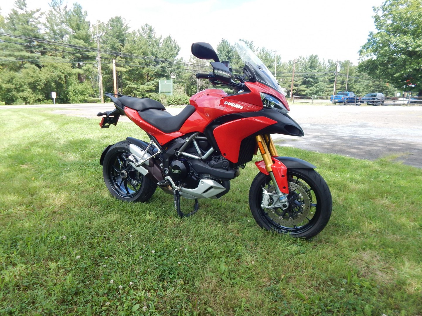 2012 Red /Black Ducati Multistrada 1200 S-Touring (ZDM12BLW5CB) with an 1198CC engine, Manual transmission, located at 6528 Lower York Road, New Hope, PA, 18938, (215) 862-9555, 40.358707, -74.977882 - Here we have a one owner Ducati Multistrada 1200 S-Touring with 1,999 original miles! This Ducati has a 1198cc L-twin engine putting power to the rear tire via a manual shifting transmission. Being a S-Touring bike, it comes with a center stand, heated grips and 2 hard luggage cases. Other options i- Photo#1