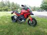 2012 Red /Black Ducati Multistrada 1200 S-Touring (ZDM12BLW5CB) with an 1198CC engine, Manual transmission, located at 6528 Lower York Road, New Hope, PA, 18938, (215) 862-9555, 40.358707, -74.977882 - Here we have a one owner Ducati Multistrada 1200 S-Touring with 1,999 original miles! This Ducati has a 1198cc L-twin engine putting power to the rear tire via a manual shifting transmission. Being a S-Touring bike, it comes with a center stand, heated grips and 2 hard luggage cases. Other options i- Photo#1