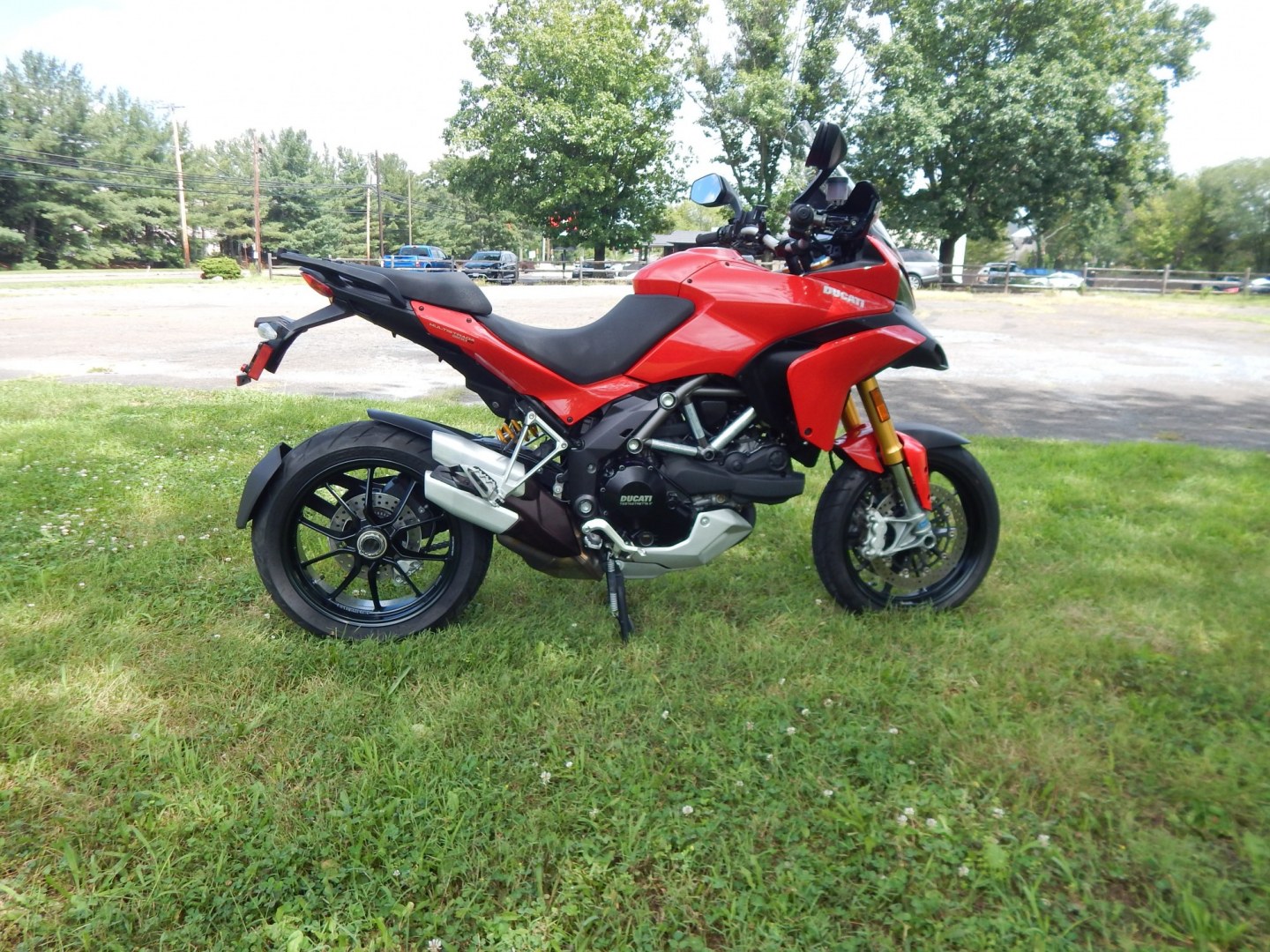 2012 Red /Black Ducati Multistrada 1200 S-Touring (ZDM12BLW5CB) with an 1198CC engine, Manual transmission, located at 6528 Lower York Road, New Hope, PA, 18938, (215) 862-9555, 40.358707, -74.977882 - Here we have a one owner Ducati Multistrada 1200 S-Touring with 1,999 original miles! This Ducati has a 1198cc L-twin engine putting power to the rear tire via a manual shifting transmission. Being a S-Touring bike, it comes with a center stand, heated grips and 2 hard luggage cases. Other options i- Photo#2