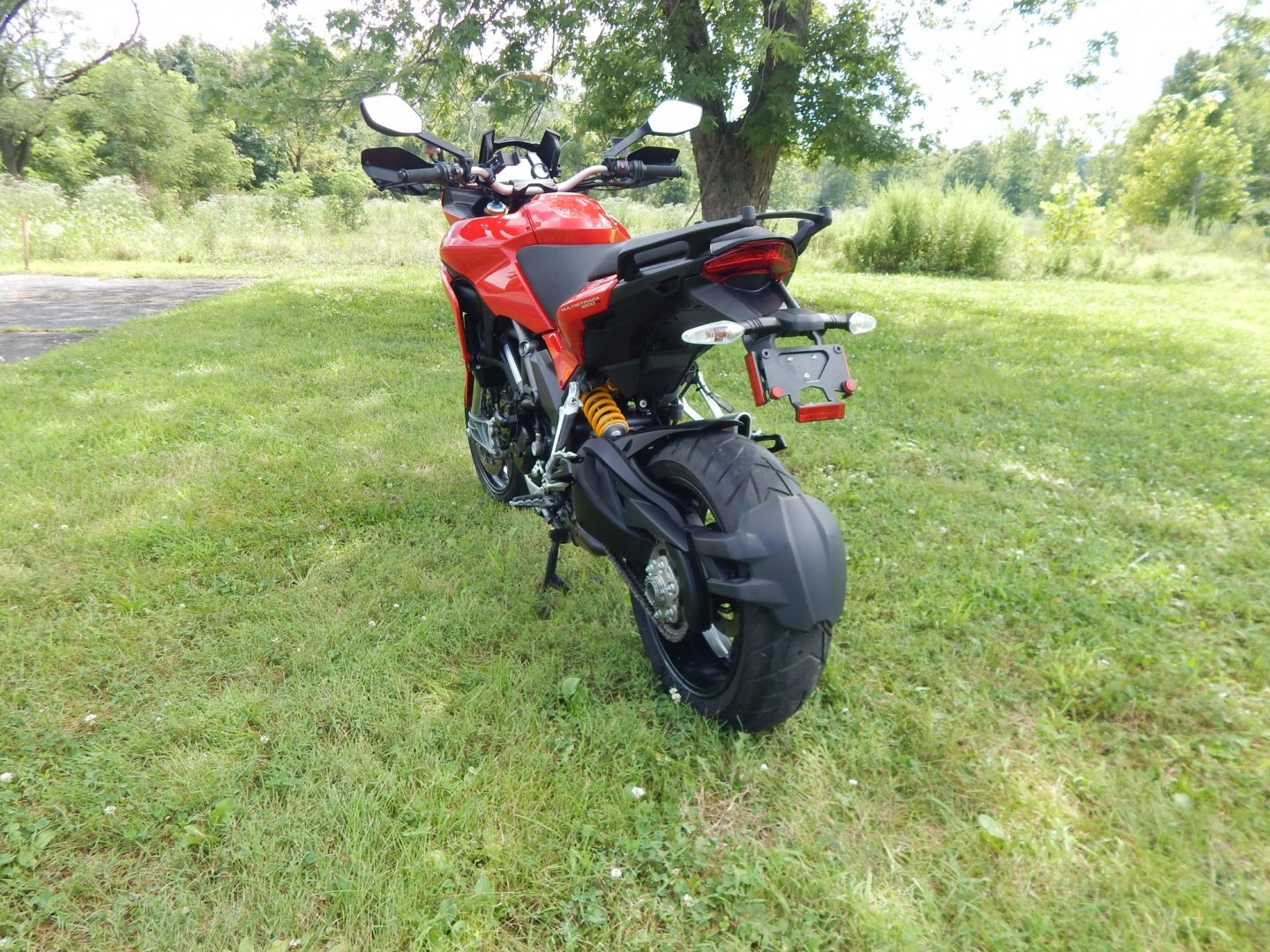 2012 Red /Black Ducati Multistrada 1200 S-Touring (ZDM12BLW5CB) with an 1198CC engine, Manual transmission, located at 6528 Lower York Road, New Hope, PA, 18938, (215) 862-9555, 40.358707, -74.977882 - Here we have a one owner Ducati Multistrada 1200 S-Touring with 1,999 original miles! This Ducati has a 1198cc L-twin engine putting power to the rear tire via a manual shifting transmission. Being a S-Touring bike, it comes with a center stand, heated grips and 2 hard luggage cases. Other options i- Photo#4