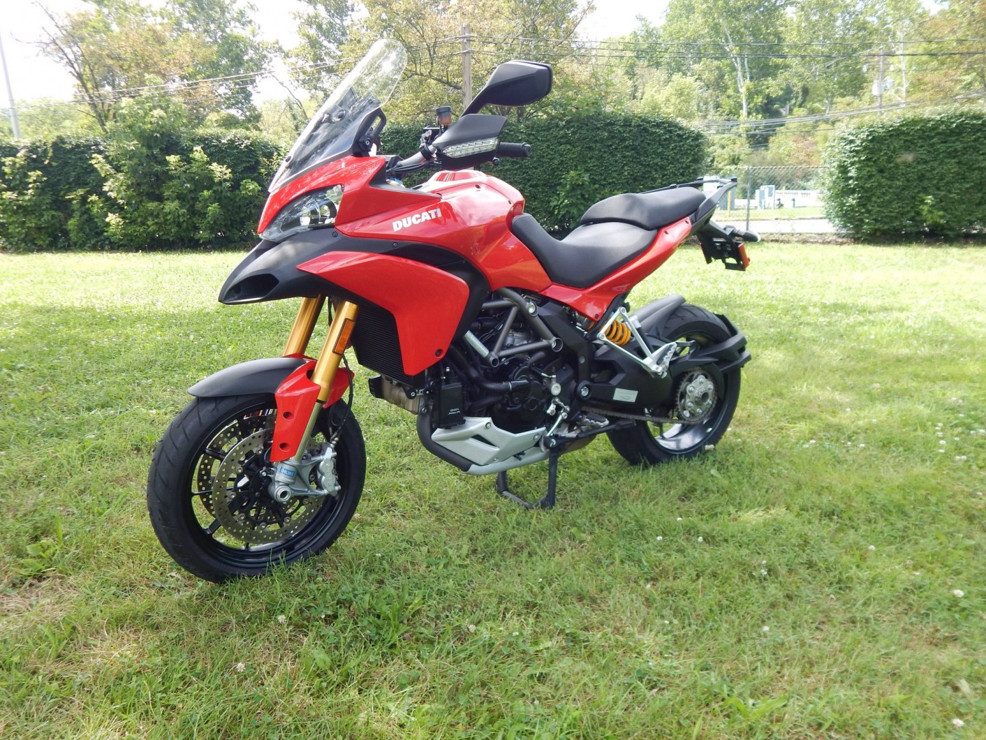 2012 Red /Black Ducati Multistrada 1200 S-Touring (ZDM12BLW5CB) with an 1198CC engine, Manual transmission, located at 6528 Lower York Road, New Hope, PA, 18938, (215) 862-9555, 40.358707, -74.977882 - Here we have a one owner Ducati Multistrada 1200 S-Touring with 1,999 original miles! This Ducati has a 1198cc L-twin engine putting power to the rear tire via a manual shifting transmission. Being a S-Touring bike, it comes with a center stand, heated grips and 2 hard luggage cases. Other options i- Photo#0