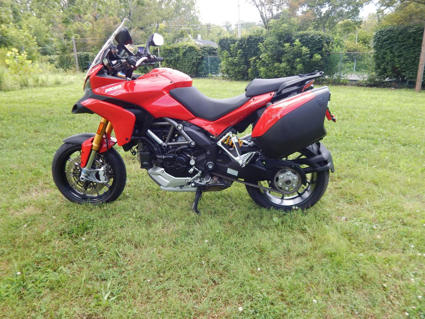 2012 Red /Black Ducati Multistrada 1200 S-Touring (ZDM12BLW5CB) with an 1198CC engine, Manual transmission, located at 6528 Lower York Road, New Hope, PA, 18938, (215) 862-9555, 40.358707, -74.977882 - Here we have a one owner Ducati Multistrada 1200 S-Touring with 1,999 original miles! This Ducati has a 1198cc L-twin engine putting power to the rear tire via a manual shifting transmission. Being a S-Touring bike, it comes with a center stand, heated grips and 2 hard luggage cases. Other options i- Photo#13