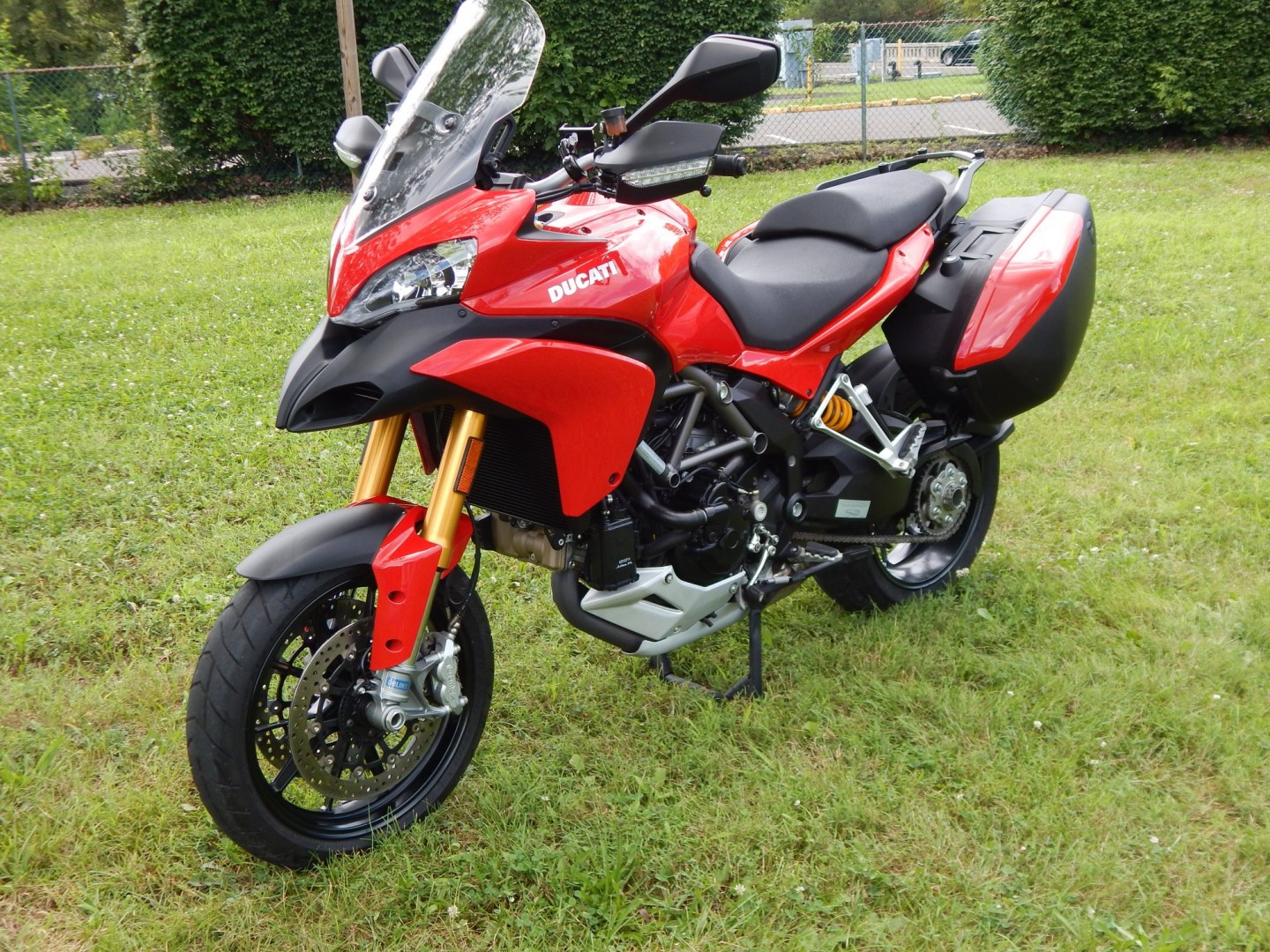2012 Red /Black Ducati Multistrada 1200 S-Touring (ZDM12BLW5CB) with an 1198CC engine, Manual transmission, located at 6528 Lower York Road, New Hope, PA, 18938, (215) 862-9555, 40.358707, -74.977882 - Here we have a one owner Ducati Multistrada 1200 S-Touring with 1,999 original miles! This Ducati has a 1198cc L-twin engine putting power to the rear tire via a manual shifting transmission. Being a S-Touring bike, it comes with a center stand, heated grips and 2 hard luggage cases. Other options i- Photo#17