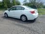 2015 White /Tan Subaru Impreza 2.0i PZEV CVT 4-Door (JF1GJAA60FH) with an 2.0L H4 DOHC 16V engine, CVT transmission, located at 6528 Lower York Road, New Hope, PA, 18938, (215) 862-9555, 40.358707, -74.977882 - Here we have a Subaru Impreza with a 2.0L H4 engine putting power to all four wheels via an automatic transmission. Options include: tan cloth, heat, AC, am/fm/disc/bluetooth/aux radio with back up camera, cruise control, power windows/locks/mirrors and tilt steering wheel. Pa inspection good until- Photo#2