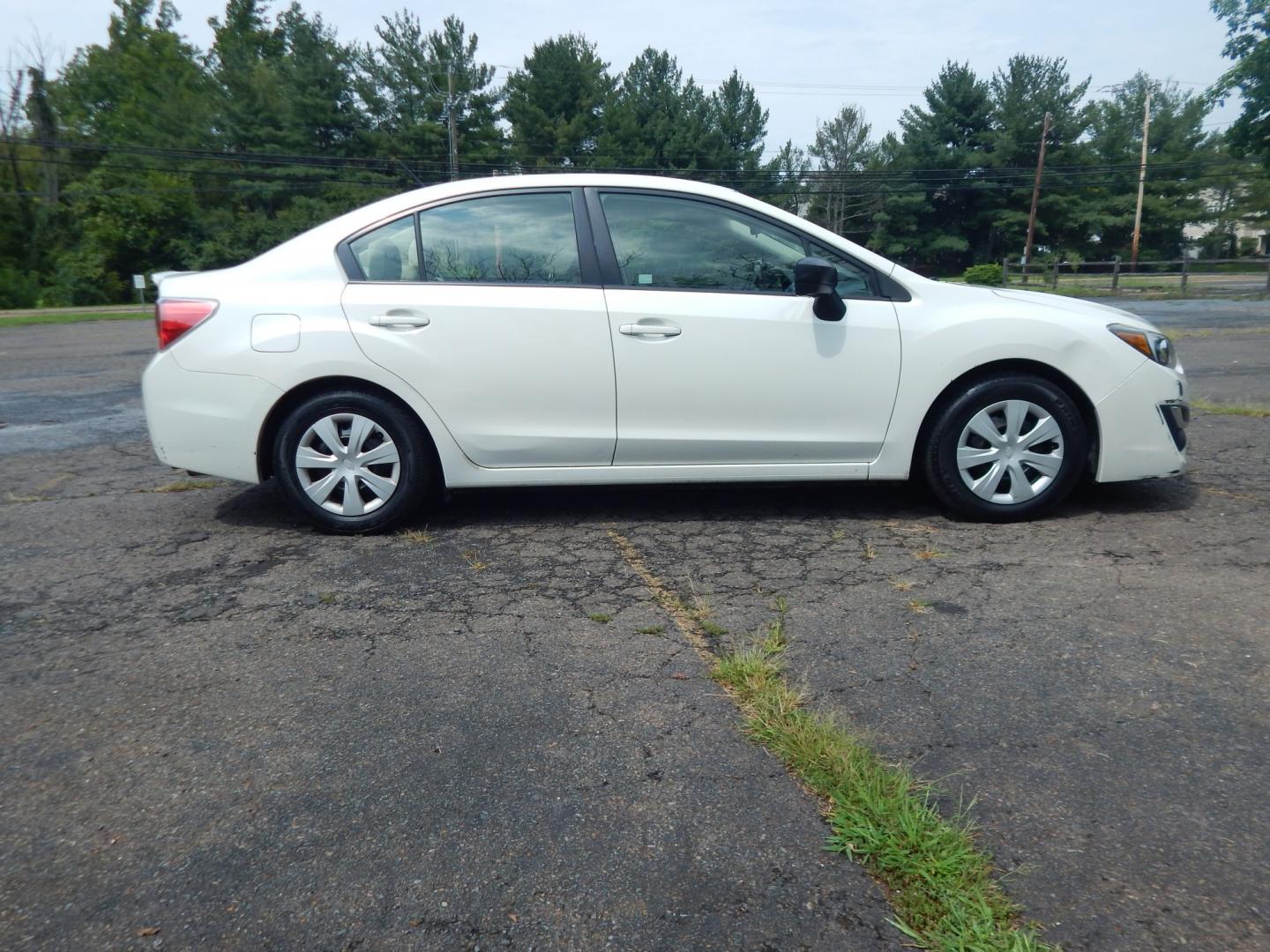 2015 White /Tan Subaru Impreza 2.0i PZEV CVT 4-Door (JF1GJAA60FH) with an 2.0L H4 DOHC 16V engine, CVT transmission, located at 6528 Lower York Road, New Hope, PA, 18938, (215) 862-9555, 40.358707, -74.977882 - Here we have a Subaru Impreza with a 2.0L H4 engine putting power to all four wheels via an automatic transmission. Options include: tan cloth, heat, AC, am/fm/disc/bluetooth/aux radio with back up camera, cruise control, power windows/locks/mirrors and tilt steering wheel. Pa inspection good until- Photo#4
