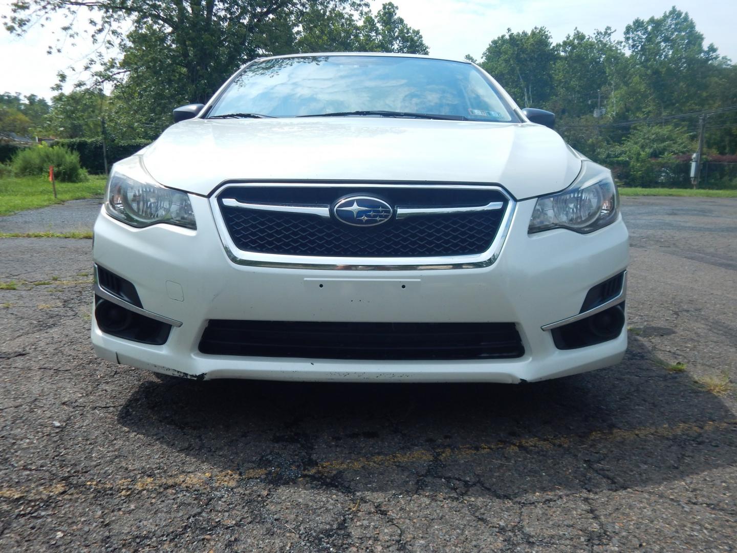 2015 White /Tan Subaru Impreza 2.0i PZEV CVT 4-Door (JF1GJAA60FH) with an 2.0L H4 DOHC 16V engine, CVT transmission, located at 6528 Lower York Road, New Hope, PA, 18938, (215) 862-9555, 40.358707, -74.977882 - Here we have a Subaru Impreza with a 2.0L H4 engine putting power to all four wheels via an automatic transmission. Options include: tan cloth, heat, AC, am/fm/disc/bluetooth/aux radio with back up camera, cruise control, power windows/locks/mirrors and tilt steering wheel. Pa inspection good until- Photo#6