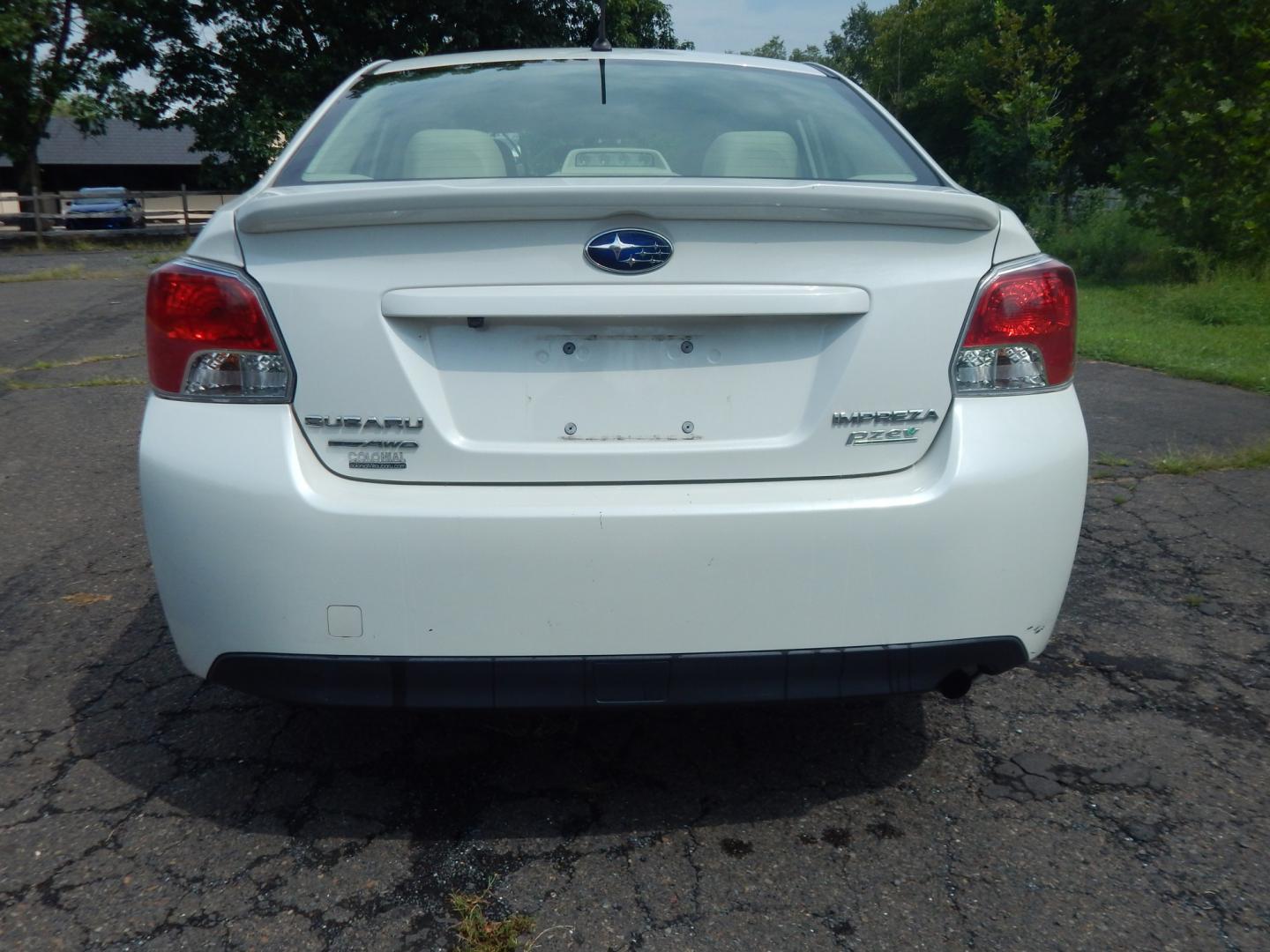 2015 White /Tan Subaru Impreza 2.0i PZEV CVT 4-Door (JF1GJAA60FH) with an 2.0L H4 DOHC 16V engine, CVT transmission, located at 6528 Lower York Road, New Hope, PA, 18938, (215) 862-9555, 40.358707, -74.977882 - Here we have a Subaru Impreza with a 2.0L H4 engine putting power to all four wheels via an automatic transmission. Options include: tan cloth, heat, AC, am/fm/disc/bluetooth/aux radio with back up camera, cruise control, power windows/locks/mirrors and tilt steering wheel. Pa inspection good until- Photo#7
