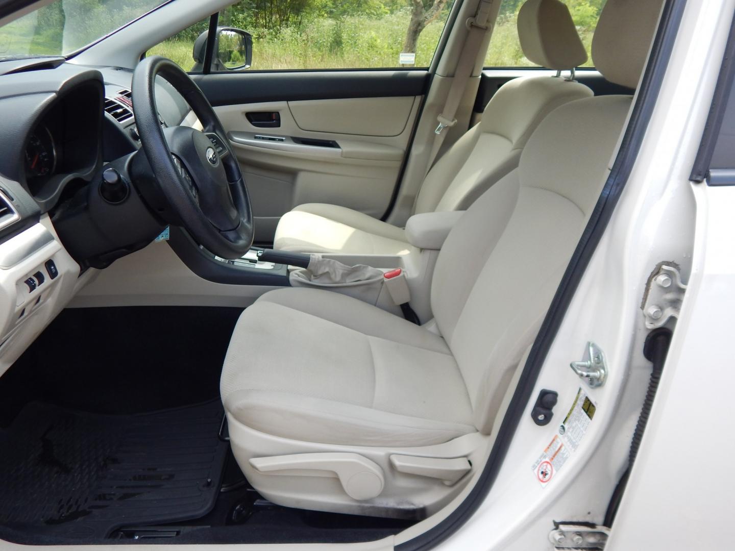 2015 White /Tan Subaru Impreza 2.0i PZEV CVT 4-Door (JF1GJAA60FH) with an 2.0L H4 DOHC 16V engine, CVT transmission, located at 6528 Lower York Road, New Hope, PA, 18938, (215) 862-9555, 40.358707, -74.977882 - Here we have a Subaru Impreza with a 2.0L H4 engine putting power to all four wheels via an automatic transmission. Options include: tan cloth, heat, AC, am/fm/disc/bluetooth/aux radio with back up camera, cruise control, power windows/locks/mirrors and tilt steering wheel. Pa inspection good until- Photo#9