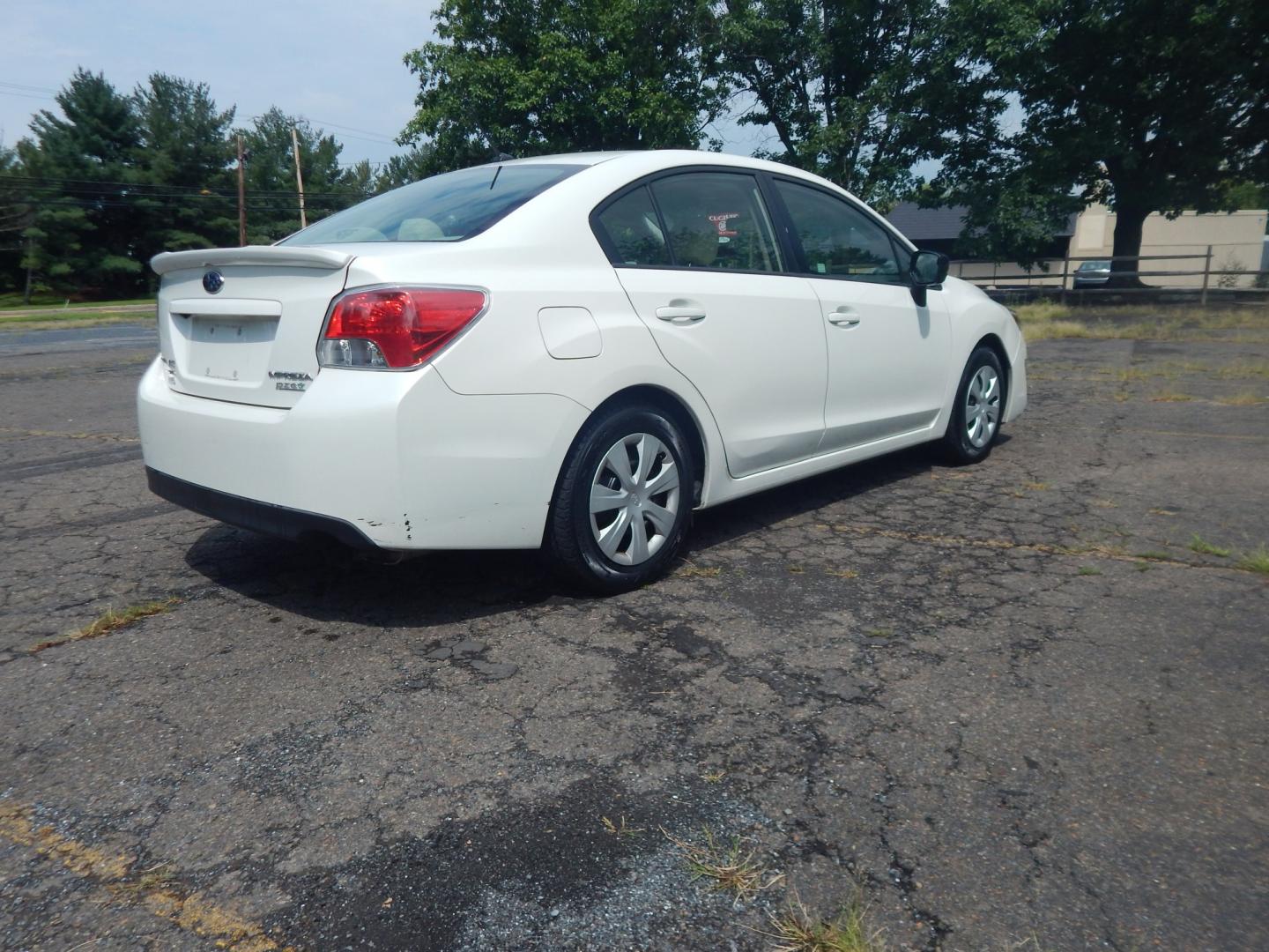 2015 White /Tan Subaru Impreza 2.0i PZEV CVT 4-Door (JF1GJAA60FH) with an 2.0L H4 DOHC 16V engine, CVT transmission, located at 6528 Lower York Road, New Hope, PA, 18938, (215) 862-9555, 40.358707, -74.977882 - Here we have a Subaru Impreza with a 2.0L H4 engine putting power to all four wheels via an automatic transmission. Options include: tan cloth, heat, AC, am/fm/disc/bluetooth/aux radio with back up camera, cruise control, power windows/locks/mirrors and tilt steering wheel. Pa inspection good until- Photo#3