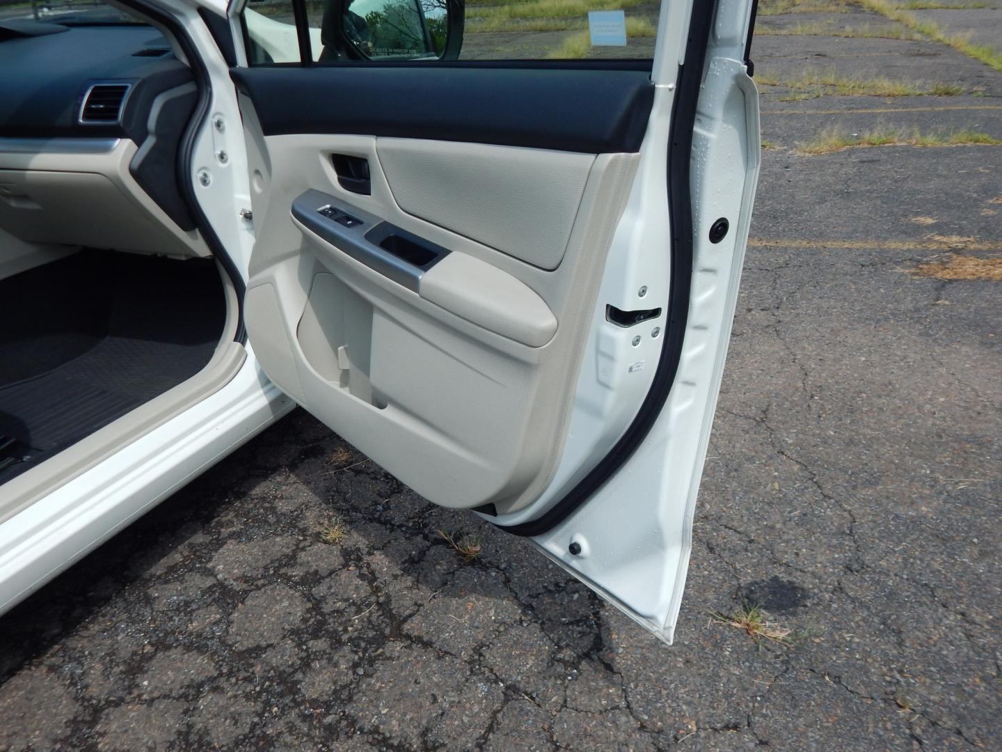 2015 White /Tan Subaru Impreza 2.0i PZEV CVT 4-Door (JF1GJAA60FH) with an 2.0L H4 DOHC 16V engine, CVT transmission, located at 6528 Lower York Road, New Hope, PA, 18938, (215) 862-9555, 40.358707, -74.977882 - Here we have a Subaru Impreza with a 2.0L H4 engine putting power to all four wheels via an automatic transmission. Options include: tan cloth, heat, AC, am/fm/disc/bluetooth/aux radio with back up camera, cruise control, power windows/locks/mirrors and tilt steering wheel. Pa inspection good until- Photo#15