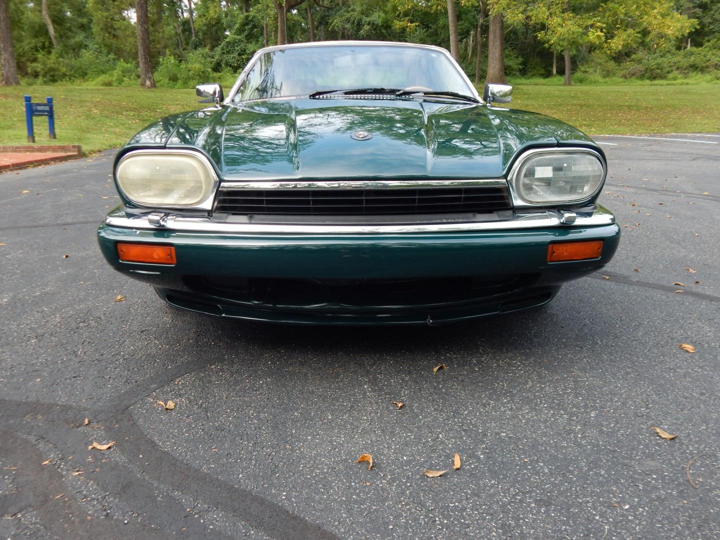 1996 Green /Tan Jaguar XJS 4.0L convertible Celebration Edition (SAJNX2748TC) with an 4.0L L6 DOHC 24V engine, 4A OD transmission, located at 6528 Lower York Road, New Hope, PA, 18938, (215) 862-9555, 40.358707, -74.977882 - Here we have a beautiful 1996 Jaguar XJS Celebration Edition for sale. The Celebration Edition was offered for the last model year of the XJS and came with contrasting color piping on the interior, Jaguar leaper logo on seats, Sapwood walnut wood on interior, chrome mirror caps, twin painted coach l- Photo#6