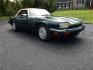 1996 Green /Tan Jaguar XJS 4.0L convertible Celebration Edition (SAJNX2748TC) with an 4.0L L6 DOHC 24V engine, 4A OD transmission, located at 6528 Lower York Road, New Hope, PA, 18938, (215) 862-9555, 40.358707, -74.977882 - Here we have a beautiful 1996 Jaguar XJS Celebration Edition for sale. The Celebration Edition was offered for the last model year of the XJS and came with contrasting color piping on the interior, Jaguar leaper logo on seats, Sapwood walnut wood on interior, chrome mirror caps, twin painted coach l- Photo#9