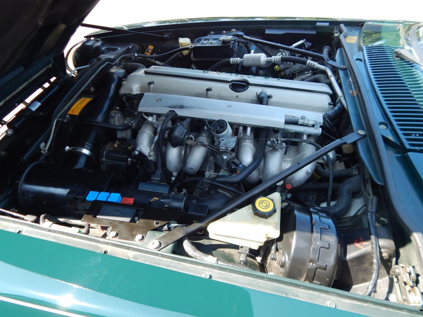 1996 Green /Tan Jaguar XJS 4.0L convertible Celebration Edition (SAJNX2748TC) with an 4.0L L6 DOHC 24V engine, 4A OD transmission, located at 6528 Lower York Road, New Hope, PA, 18938, (215) 862-9555, 40.358707, -74.977882 - Here we have a beautiful 1996 Jaguar XJS Celebration Edition for sale. The Celebration Edition was offered for the last model year of the XJS and came with contrasting color piping on the interior, Jaguar leaper logo on seats, Sapwood walnut wood on interior, chrome mirror caps, twin painted coach l- Photo#24