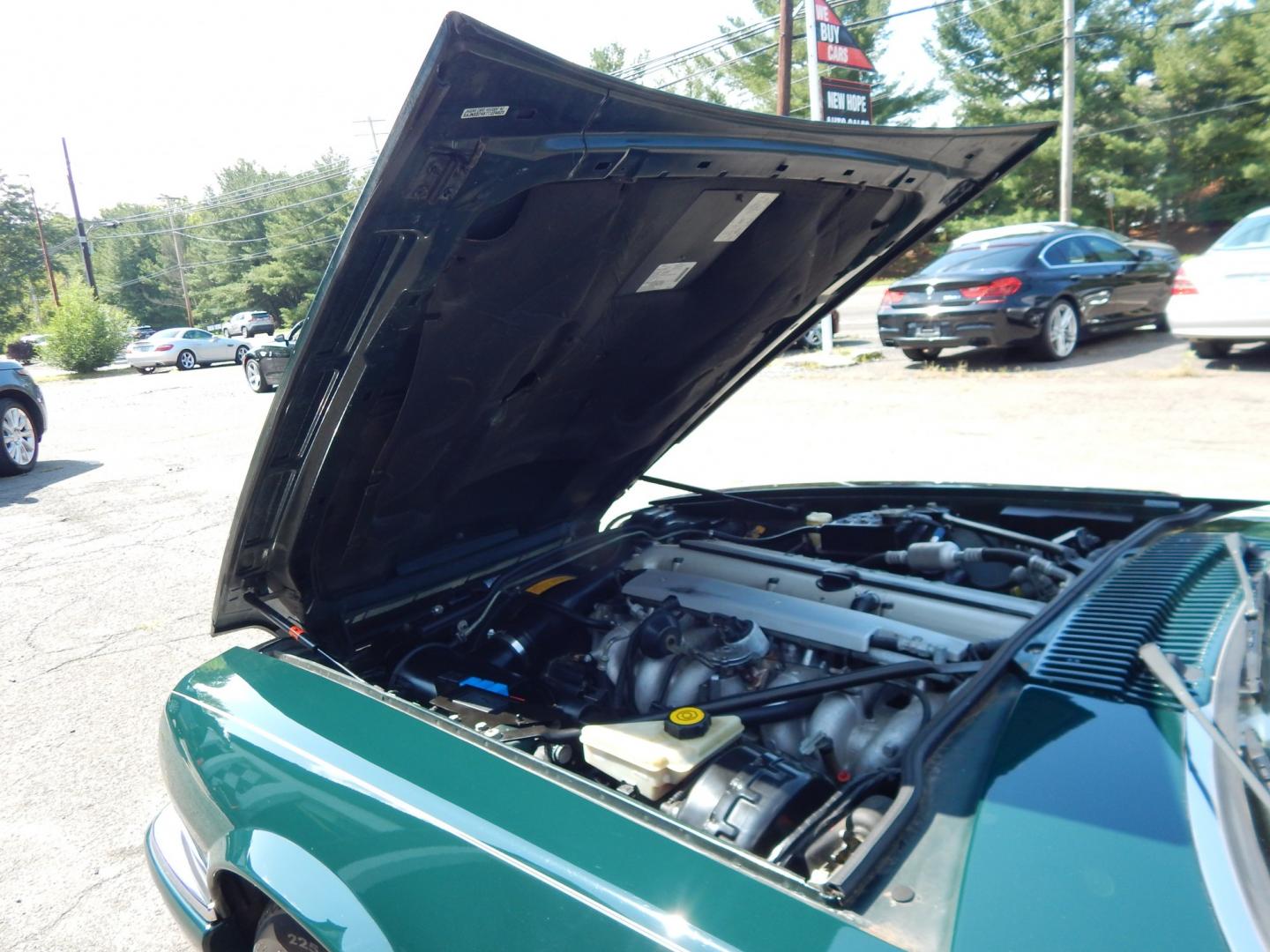1996 Green /Tan Jaguar XJS 4.0L convertible Celebration Edition (SAJNX2748TC) with an 4.0L L6 DOHC 24V engine, 4A OD transmission, located at 6528 Lower York Road, New Hope, PA, 18938, (215) 862-9555, 40.358707, -74.977882 - Here we have a beautiful 1996 Jaguar XJS Celebration Edition for sale. The Celebration Edition was offered for the last model year of the XJS and came with contrasting color piping on the interior, Jaguar leaper logo on seats, Sapwood walnut wood on interior, chrome mirror caps, twin painted coach l- Photo#25