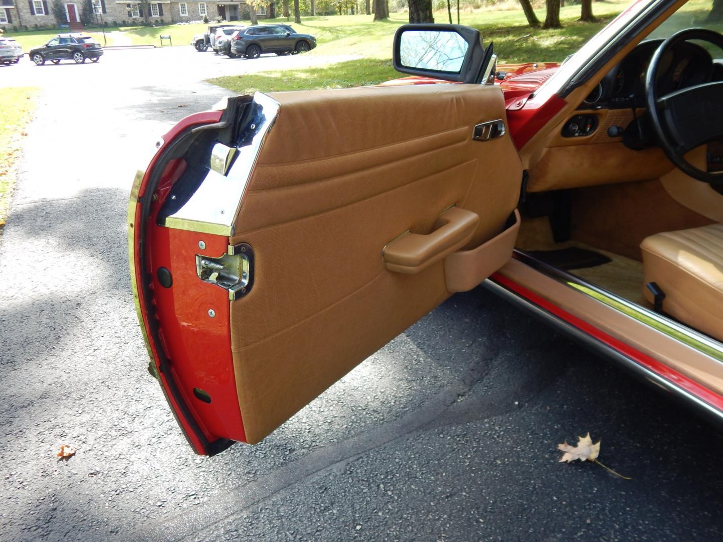 1989 Red /Tan Mercedes-Benz 560 SL convertible (WDBBA48DXKA) with an 5.6L V8 SOHC 16V engine, 4A transmission, located at 6528 Lower York Road, New Hope, PA, 18938, (215) 862-9555, 40.358707, -74.977882 - Here we have a beautiful, ONE OWNER, 1989 Mercedes 560SL. 1989 is the last year of the legendary R107 body style. Options include: 5.5L V8, RWD, automatic transmission, removable hard top, retractable soft top, ABS, power steering, power brakes, limited slip differential, AM/FM/Cassette radio, power- Photo#101