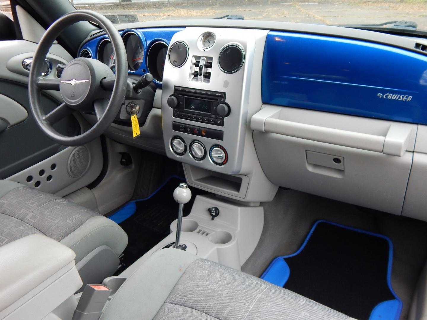 2006 Blue /Gray Chrysler PT Cruiser Touring Convertible (3C3JY55E16T) with an 2.4L L4 DOHC 16V TURBO engine, Automatic transmission, located at 6528 Lower York Road, New Hope, PA, 18938, (215) 862-9555, 40.358707, -74.977882 - Here we have a PT Cruiser Touring Convertible with a 2.4L 4 cylinder TURBO engine putting power to the front wheels via an automatic transmission. Options include: gray cloth, manual moving seats, heat, AC, AM/FM/CD/AUX radio, cruise control, tilt steering wheel, power windows/locks/mirrors, soft to- Photo#13