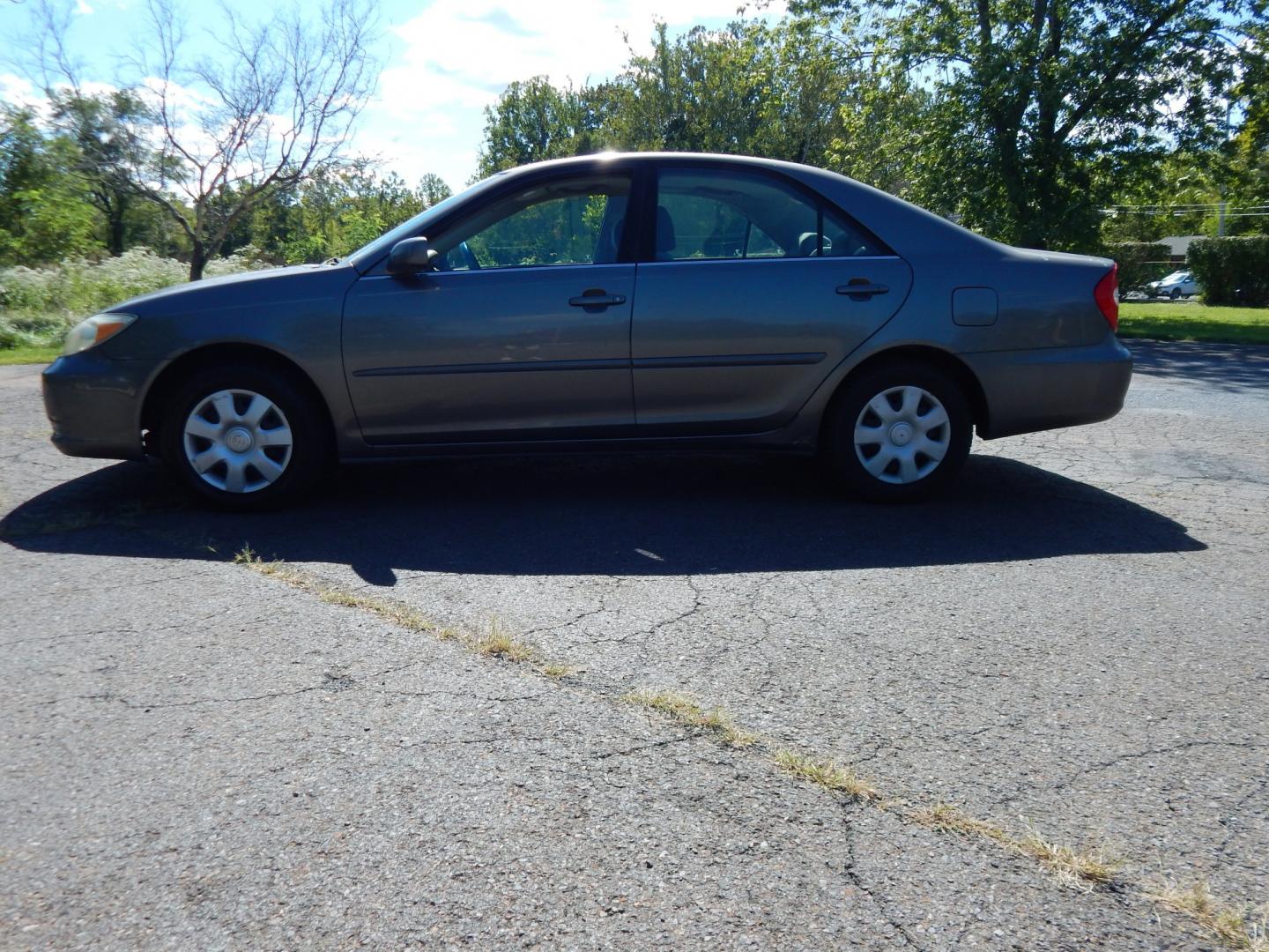 2002 Gray /Gray Toyota Camry SE (4T1BE32K62U) with an 4 Cylinder Engine engine, Automatic transmission, located at 6528 Lower York Road, New Hope, PA, 18938, (215) 862-9555, 40.358707, -74.977882 - Here we have a Toyota Camry with a 2.4L inline 4 cylinder engine putting power to the front wheels via an automatic transmission. Options include: gray cloth, power drivers seat, heat, AC, AM/FM/CD/TAPE radio, tilt steering wheel, cruise control, power windows/mirrors and 15 inch wheels with General- Photo#1