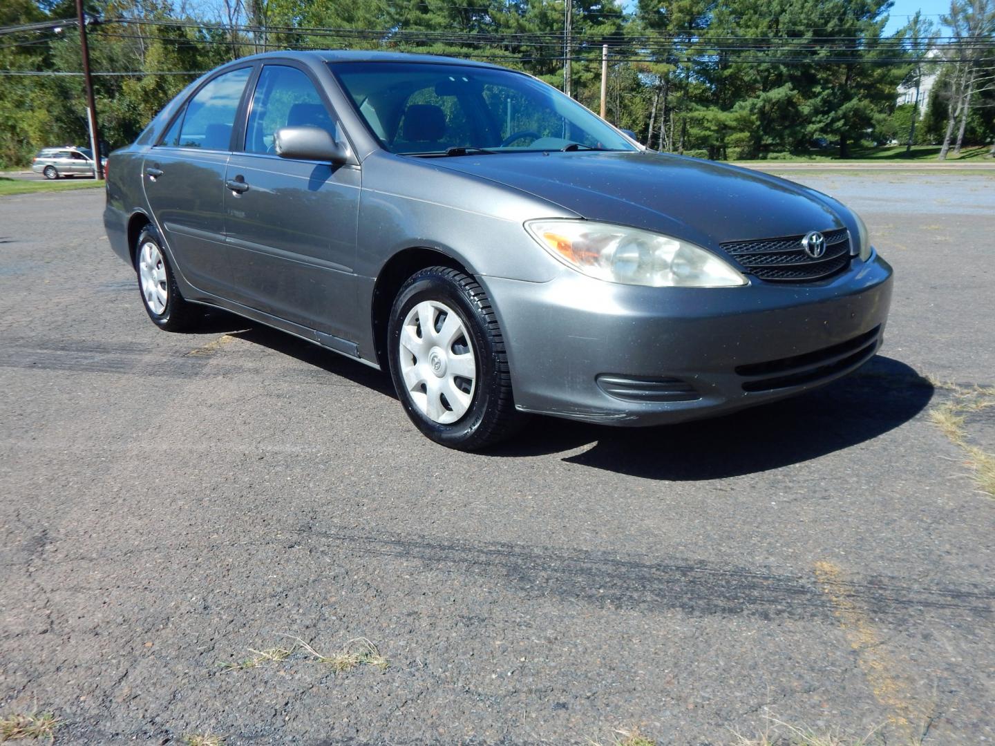 2002 Gray /Gray Toyota Camry SE (4T1BE32K62U) with an 4 Cylinder Engine engine, Automatic transmission, located at 6528 Lower York Road, New Hope, PA, 18938, (215) 862-9555, 40.358707, -74.977882 - Here we have a Toyota Camry with a 2.4L inline 4 cylinder engine putting power to the front wheels via an automatic transmission. Options include: gray cloth, power drivers seat, heat, AC, AM/FM/CD/TAPE radio, tilt steering wheel, cruise control, power windows/mirrors and 15 inch wheels with General- Photo#5