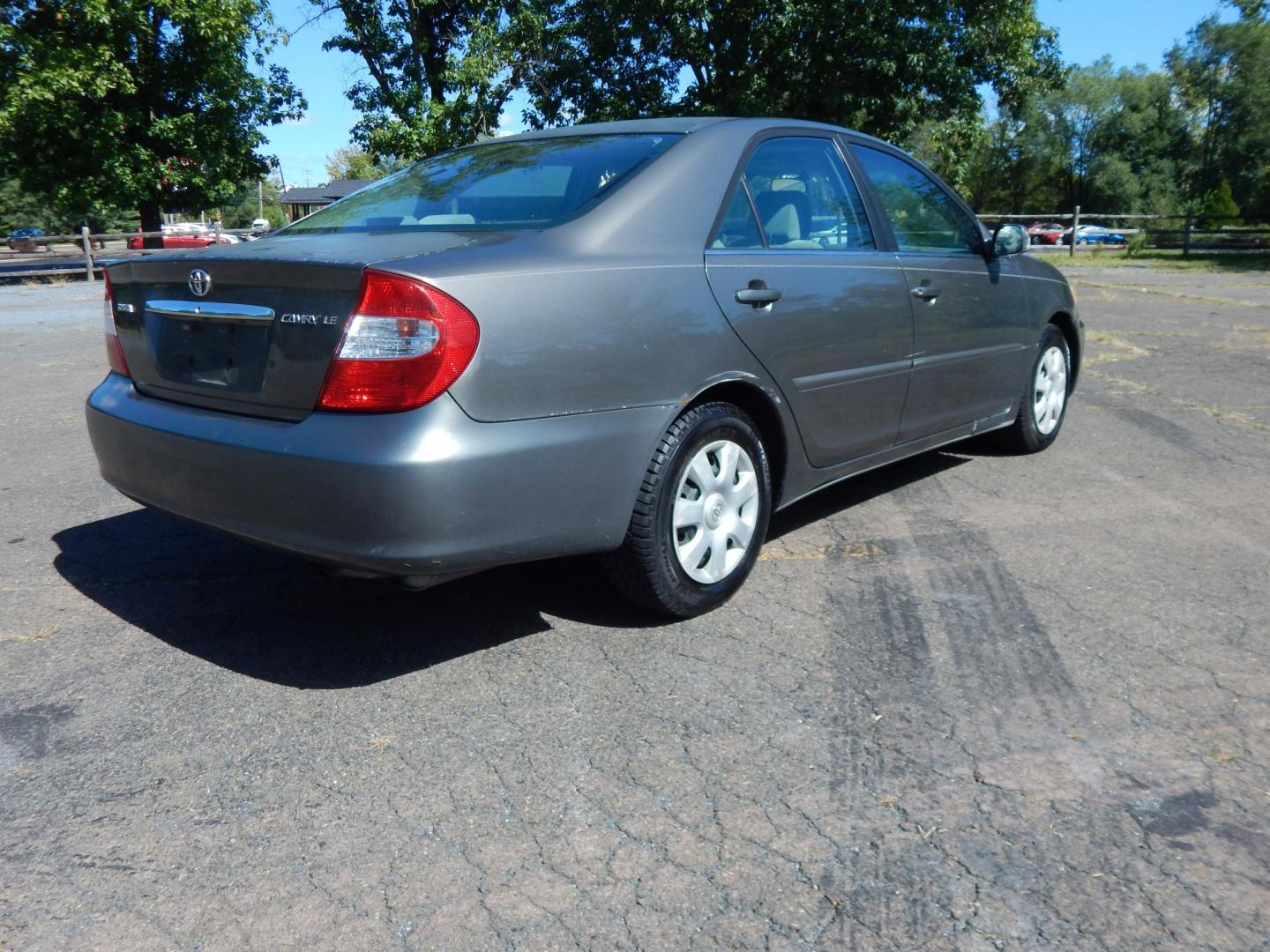 2002 Gray /Gray Toyota Camry SE (4T1BE32K62U) with an 4 Cylinder Engine engine, Automatic transmission, located at 6528 Lower York Road, New Hope, PA, 18938, (215) 862-9555, 40.358707, -74.977882 - Here we have a Toyota Camry with a 2.4L inline 4 cylinder engine putting power to the front wheels via an automatic transmission. Options include: gray cloth, power drivers seat, heat, AC, AM/FM/CD/TAPE radio, tilt steering wheel, cruise control, power windows/mirrors and 15 inch wheels with General- Photo#3