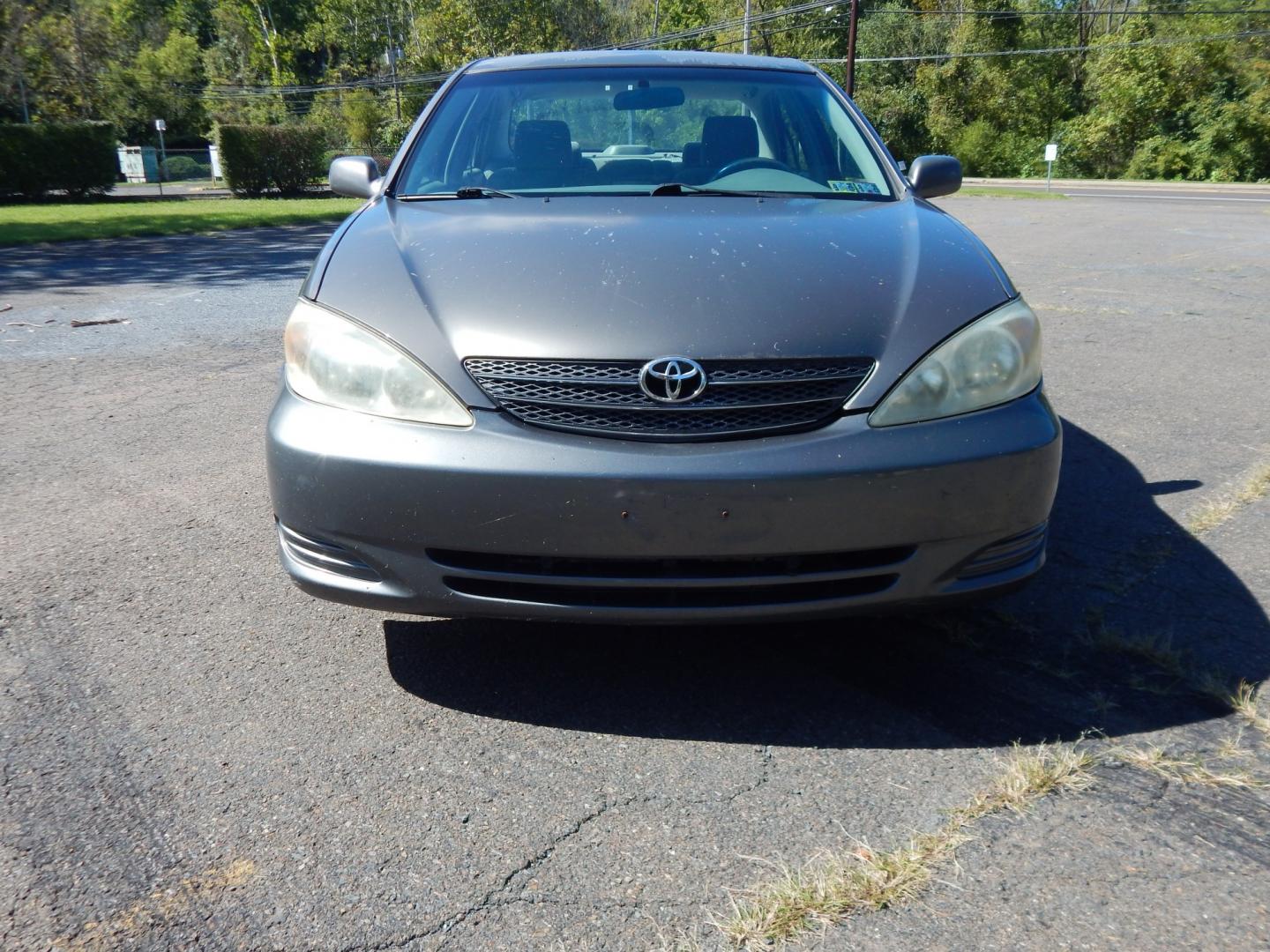 2002 Gray /Gray Toyota Camry SE (4T1BE32K62U) with an 4 Cylinder Engine engine, Automatic transmission, located at 6528 Lower York Road, New Hope, PA, 18938, (215) 862-9555, 40.358707, -74.977882 - Here we have a Toyota Camry with a 2.4L inline 4 cylinder engine putting power to the front wheels via an automatic transmission. Options include: gray cloth, power drivers seat, heat, AC, AM/FM/CD/TAPE radio, tilt steering wheel, cruise control, power windows/mirrors and 15 inch wheels with General- Photo#6
