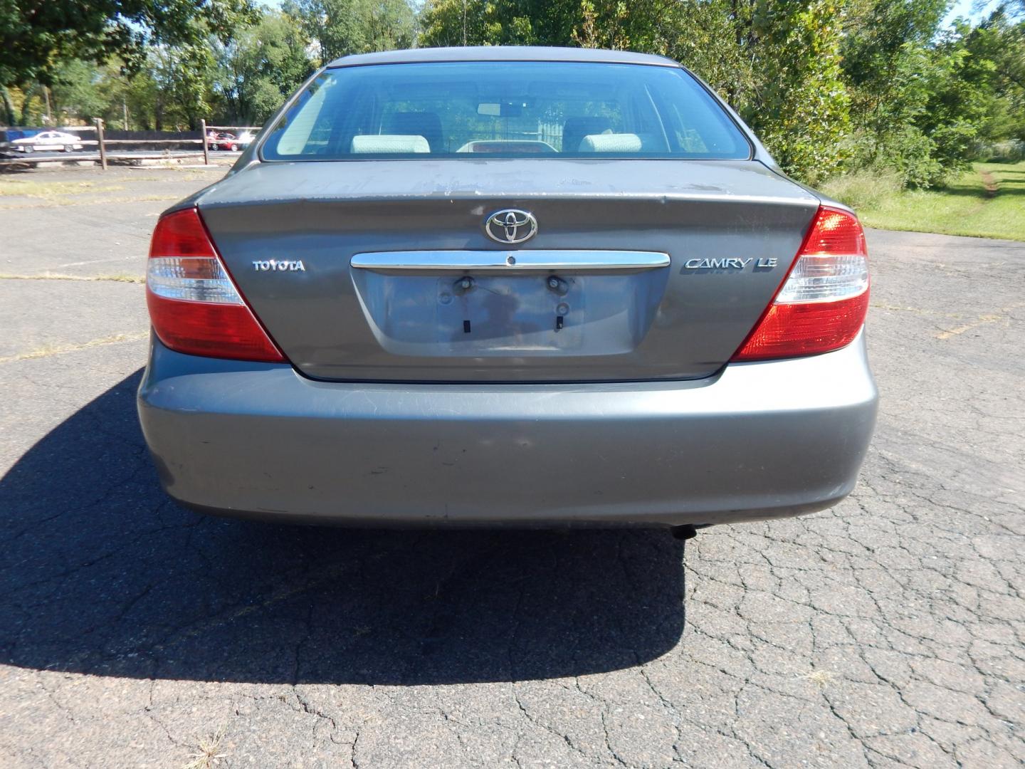 2002 Gray /Gray Toyota Camry SE (4T1BE32K62U) with an 4 Cylinder Engine engine, Automatic transmission, located at 6528 Lower York Road, New Hope, PA, 18938, (215) 862-9555, 40.358707, -74.977882 - Here we have a Toyota Camry with a 2.4L inline 4 cylinder engine putting power to the front wheels via an automatic transmission. Options include: gray cloth, power drivers seat, heat, AC, AM/FM/CD/TAPE radio, tilt steering wheel, cruise control, power windows/mirrors and 15 inch wheels with General- Photo#7