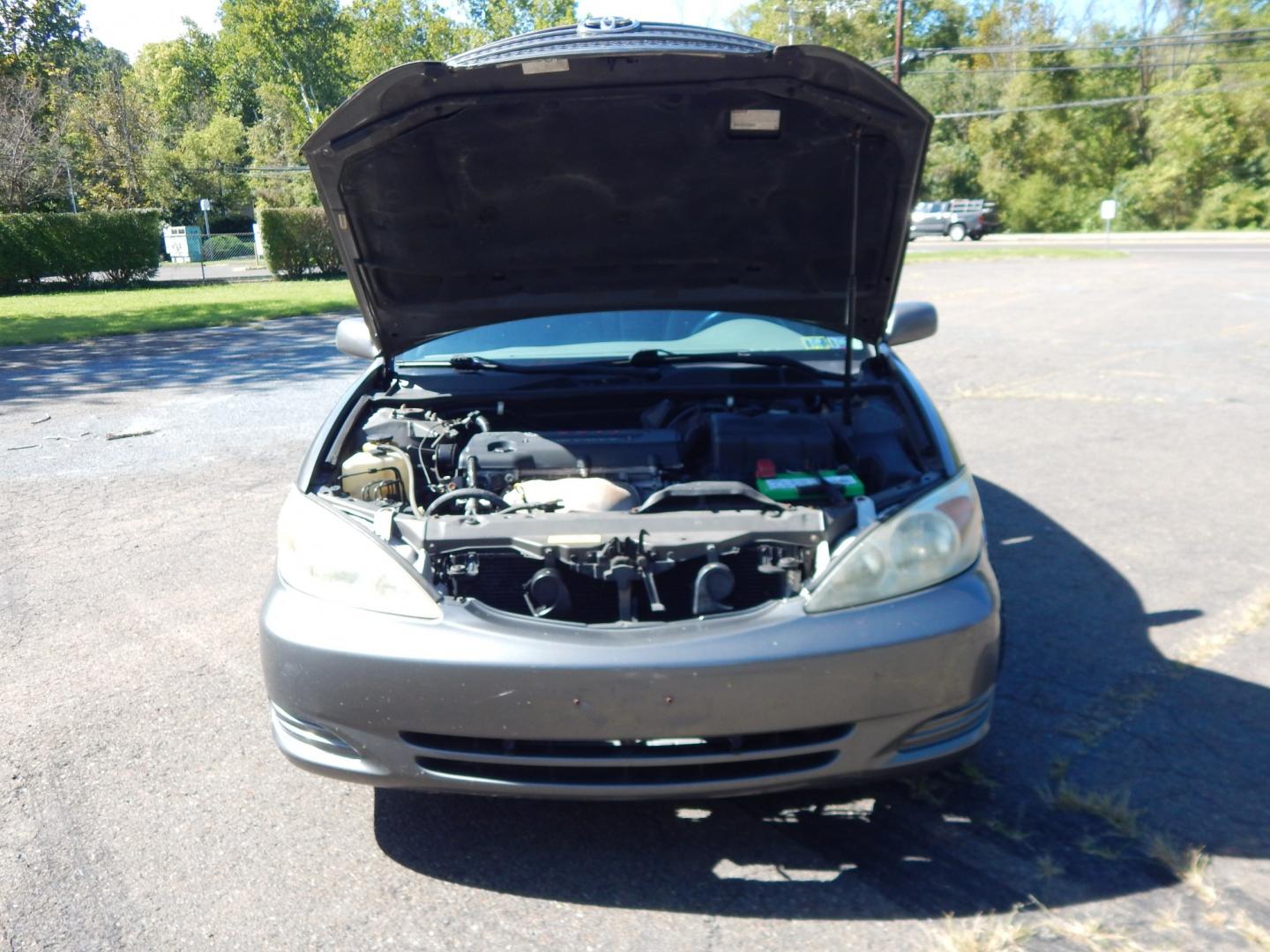2002 Gray /Gray Toyota Camry SE (4T1BE32K62U) with an 4 Cylinder Engine engine, Automatic transmission, located at 6528 Lower York Road, New Hope, PA, 18938, (215) 862-9555, 40.358707, -74.977882 - Here we have a Toyota Camry with a 2.4L inline 4 cylinder engine putting power to the front wheels via an automatic transmission. Options include: gray cloth, power drivers seat, heat, AC, AM/FM/CD/TAPE radio, tilt steering wheel, cruise control, power windows/mirrors and 15 inch wheels with General- Photo#16